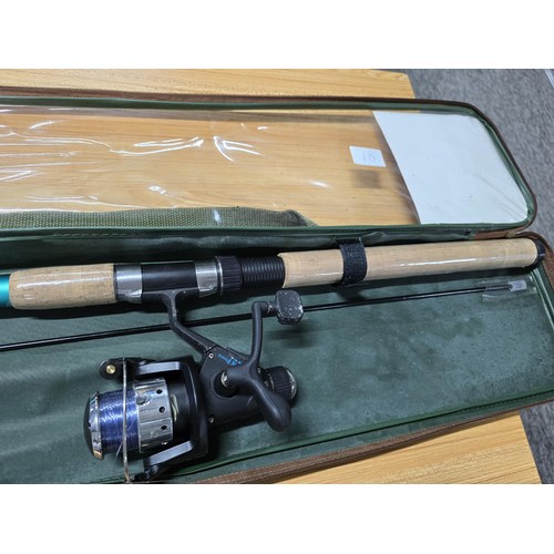 10 - A cased Ledger/feeder fishing rod set 300-5 complete with reel, tackle, hooks, etc. Had very little ... 