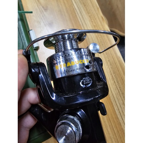 14 - A Mitchell Universe II spin 2 piece rod, complete with auris Trabucco reel, along with a fishing tac... 