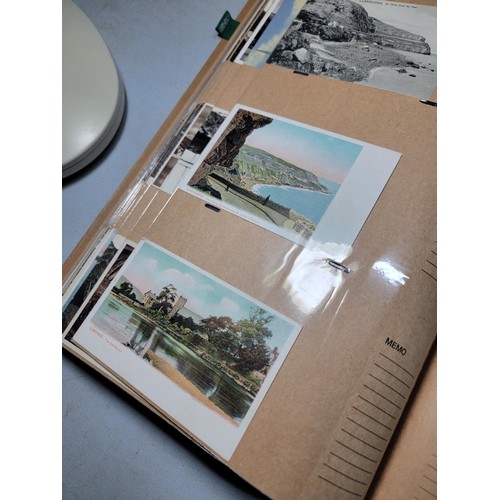 122 - Large light brown complete album of 300 Antique north wales postcards all in good order in protectiv... 