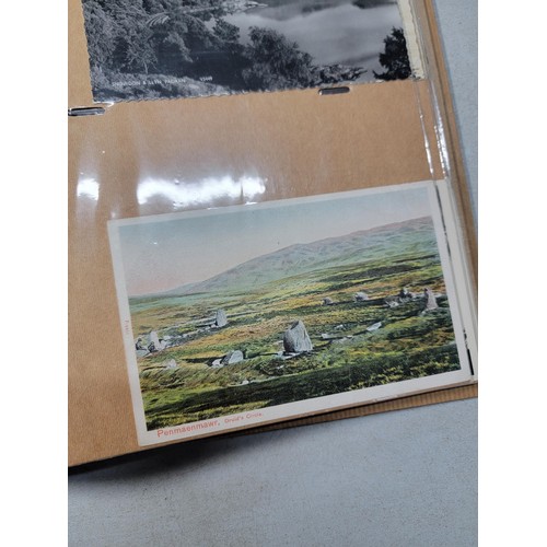 122 - Large light brown complete album of 300 Antique north wales postcards all in good order in protectiv... 