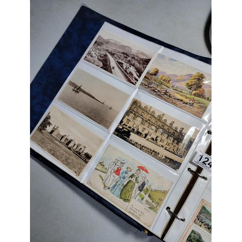 124 - Large blue album containing 250 north wales Antique postcards inc Rhos on sea, Lllangollen, Bettws -... 