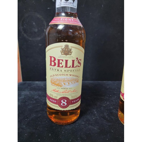 134 - 2x bottles of 8 year matured Bells Whisky new and sealed  in good order