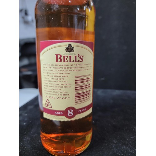 134 - 2x bottles of 8 year matured Bells Whisky new and sealed  in good order