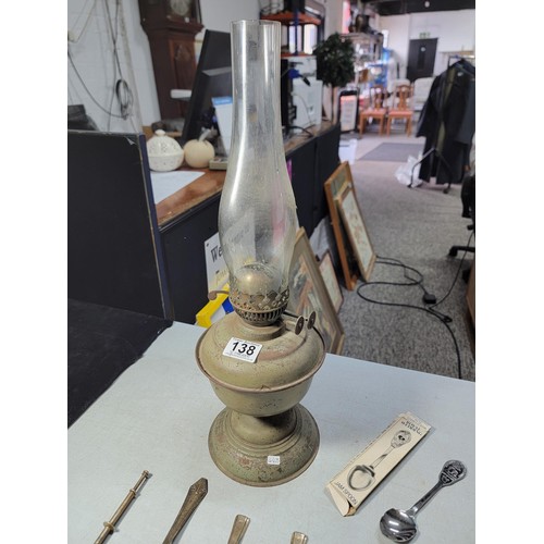 138 - Quantity of collectables inc a metal oil lamp with chimney, a collection of plated cutlery along wit... 