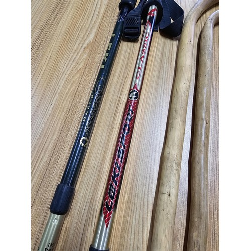 16 - 2 x Height adjustable walking poles see pictures for the makers mark along with 2 wooden walking sti... 