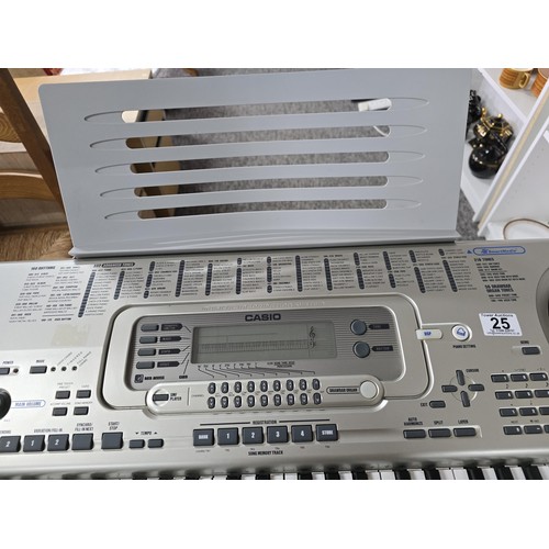 25 - Good quality comprehensive Casio WK-3200 keyboard with 160 rhythms 218 tones and 50 drawbar organ to... 