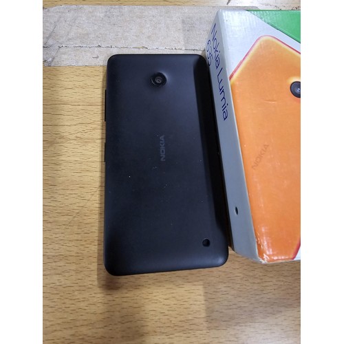 28 - Nokia Lumia 635 mobile phone complete in original box and with charging cable factory reset ready fo... 