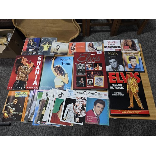 36 - Quantity of books, DVD's and CD's all relating to Elvis Presley and Shania Twain, along with a large... 