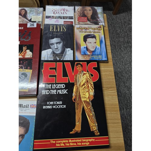 36 - Quantity of books, DVD's and CD's all relating to Elvis Presley and Shania Twain, along with a large... 