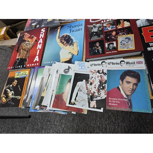 36 - Quantity of books, DVD's and CD's all relating to Elvis Presley and Shania Twain, along with a large... 