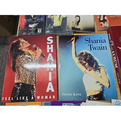 36 - Quantity of books, DVD's and CD's all relating to Elvis Presley and Shania Twain, along with a large... 