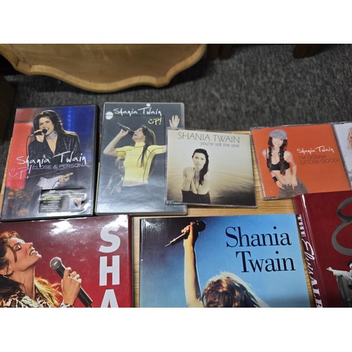 36 - Quantity of books, DVD's and CD's all relating to Elvis Presley and Shania Twain, along with a large... 