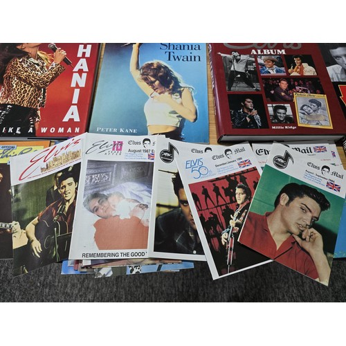 36 - Quantity of books, DVD's and CD's all relating to Elvis Presley and Shania Twain, along with a large... 