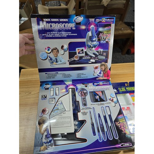 43 - A comprehensive child's microscope set with 57 pieces having 100x, 600x, 1200x, complete and unused ... 