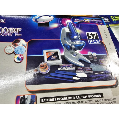 43 - A comprehensive child's microscope set with 57 pieces having 100x, 600x, 1200x, complete and unused ... 