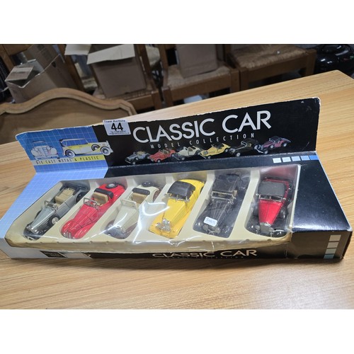 44 - A classic car diecast model collection containing 6 cars in unused condition.