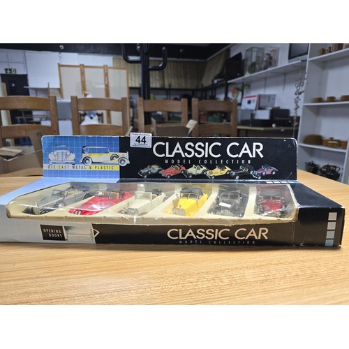 44 - A classic car diecast model collection containing 6 cars in unused condition.