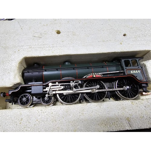 56 - A rare boxed Hornby R1007 football special train set to include Liverpool loco and tender, 3 matchin... 