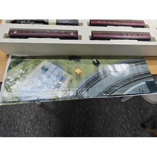 56 - A rare boxed Hornby R1007 football special train set to include Liverpool loco and tender, 3 matchin... 