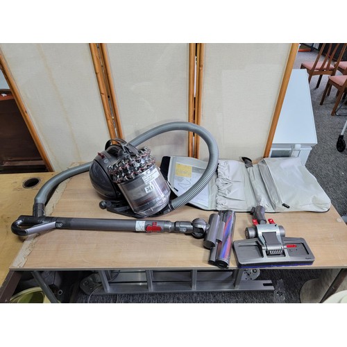 361 - Dyson DC 54 fully reconditioned vacuum cleaner with bag full of accessories in full working order