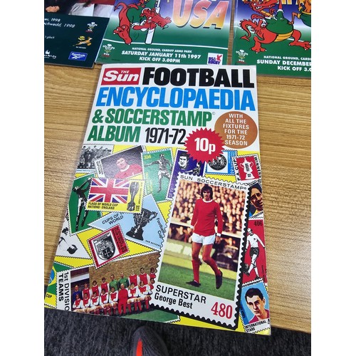 72 - A large collection of Rugby programmes along with a complete The Sun encyclopedia and soccer stamp a... 