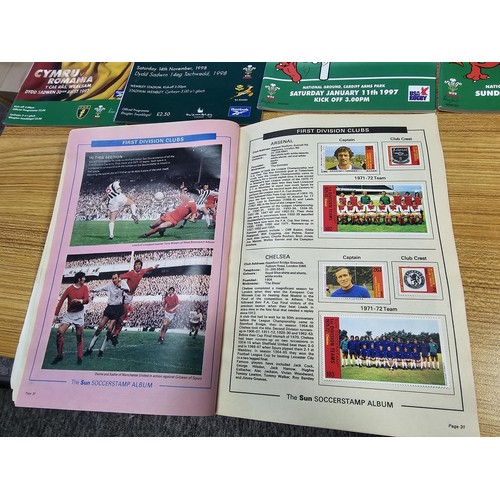 72 - A large collection of Rugby programmes along with a complete The Sun encyclopedia and soccer stamp a... 