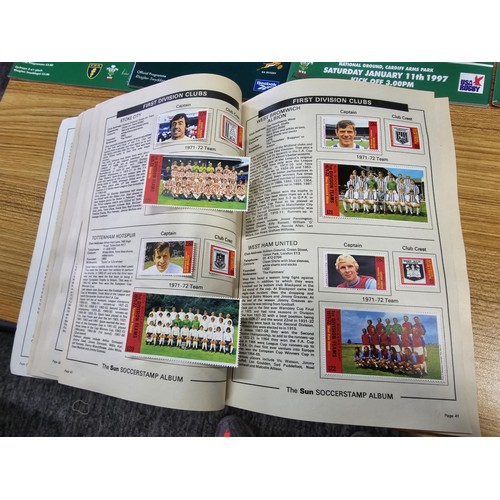 72 - A large collection of Rugby programmes along with a complete The Sun encyclopedia and soccer stamp a... 