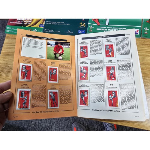 72 - A large collection of Rugby programmes along with a complete The Sun encyclopedia and soccer stamp a... 