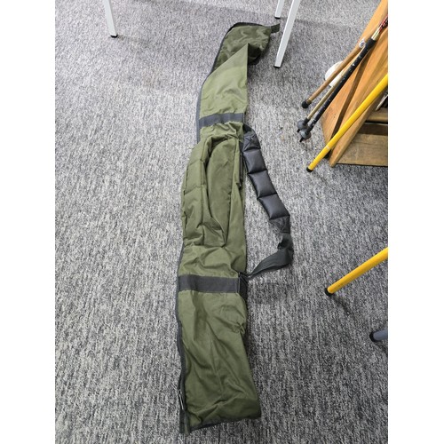 73 - A quantity of fishing related bags to include carp fishing bag by Crane, a fishing rod Holdall by Cr... 