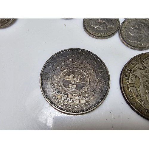 174 - A collection of various coins to include a large quantity of silver cons to include a good amount of... 