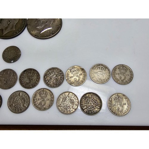 174 - A collection of various coins to include a large quantity of silver cons to include a good amount of... 