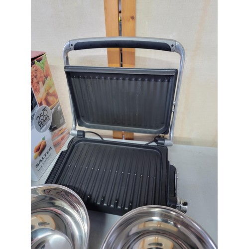 Boxed Salter low fat fryer in box working, a Foreman grill