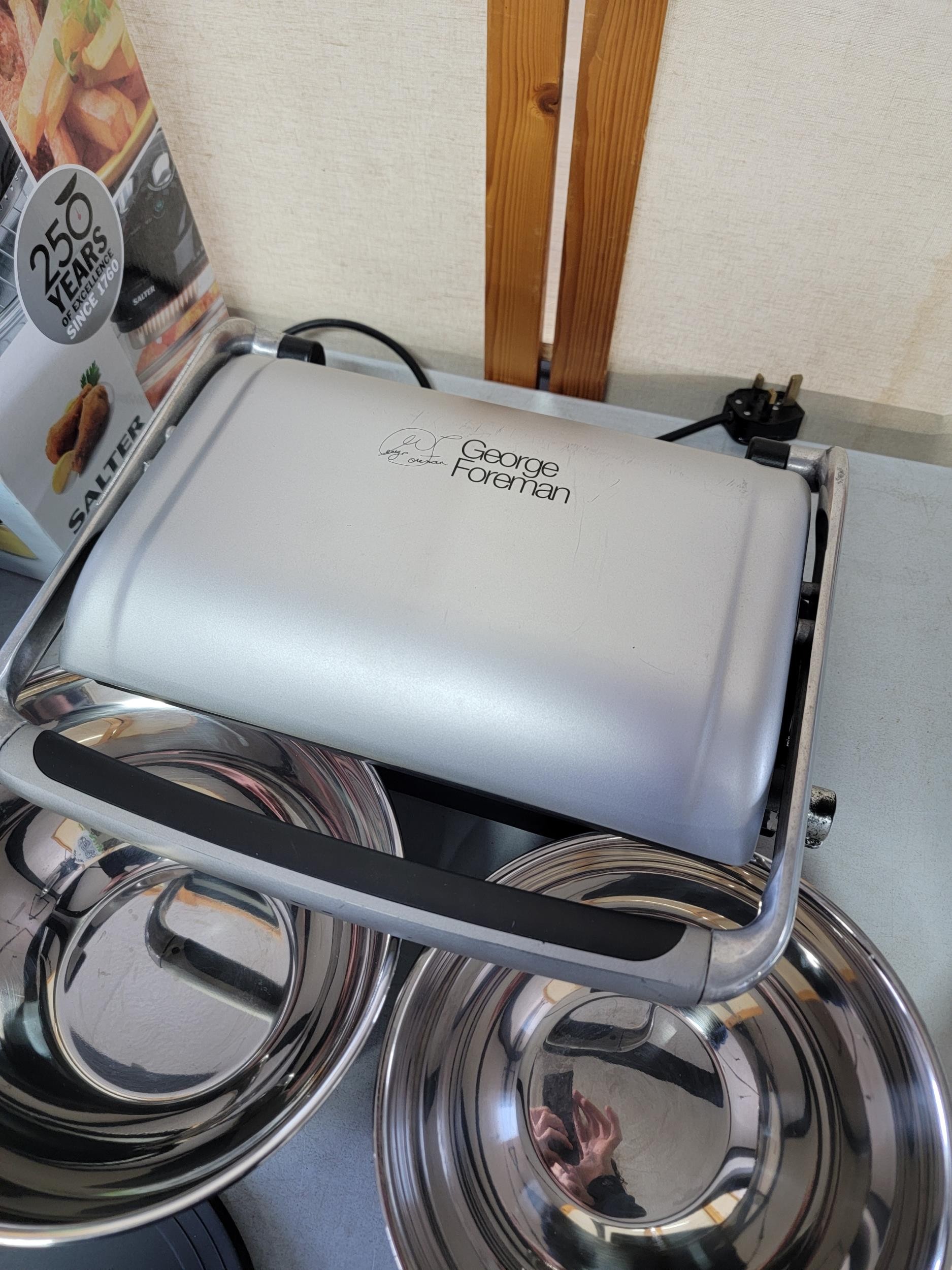 Boxed Salter low fat fryer in box working, a Foreman grill