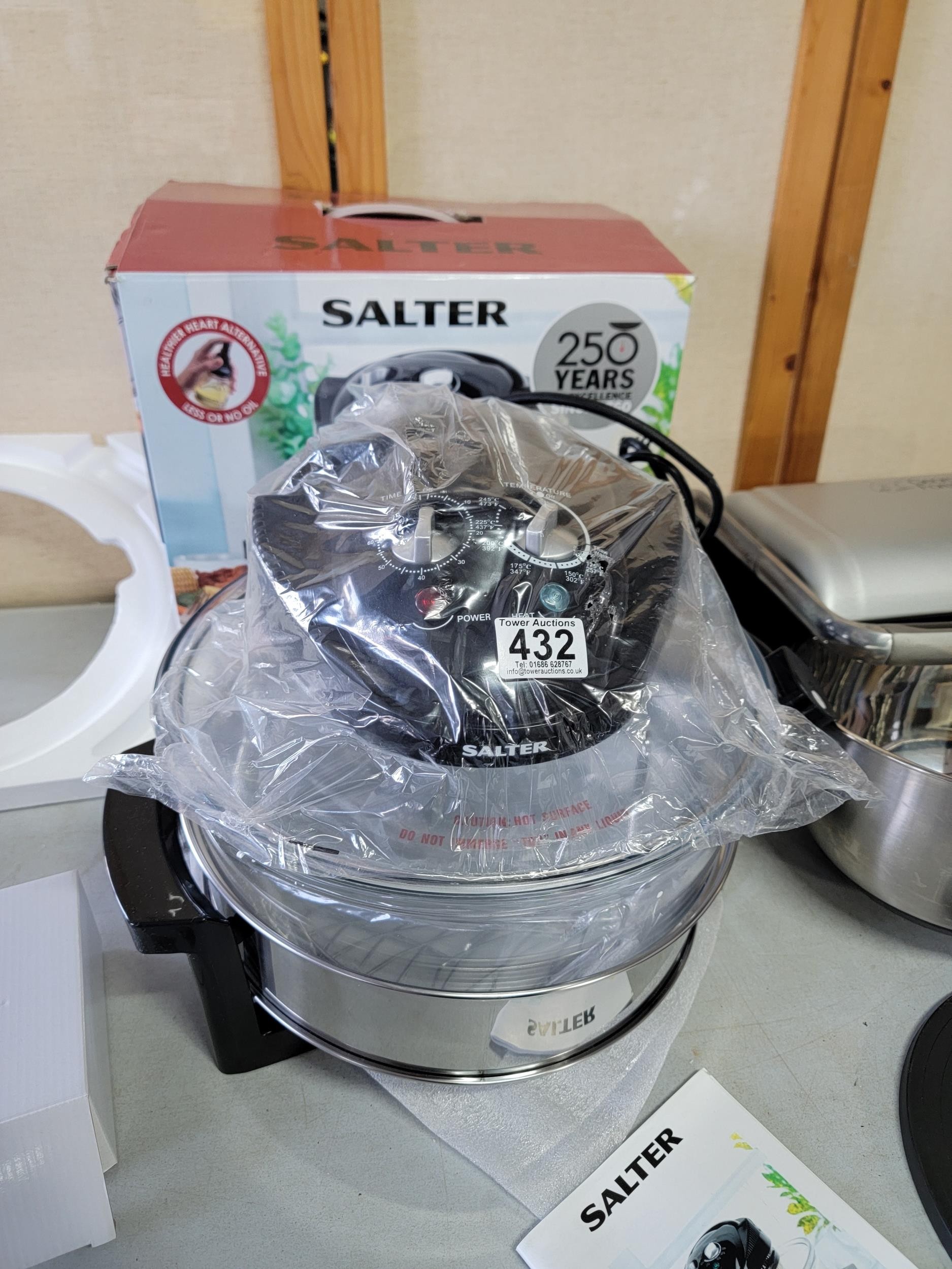 Boxed Salter low fat fryer in box working, a Foreman grill