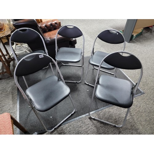 456 - Quantity of 5x metal framed black rexine fold up chairs, one has minor damage to the seat otherwise ... 