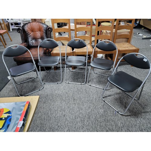 456 - Quantity of 5x metal framed black rexine fold up chairs, one has minor damage to the seat otherwise ... 