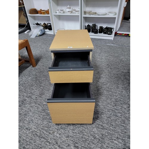 461 - Two drawer filing cabinet on castors, with supporting castor under the drawers to ease opening locka... 