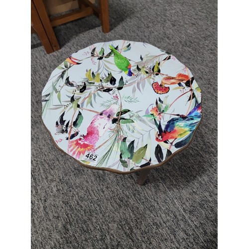 462 - Circular top sewing table with yellow lining drawer to the base has been decorated with bird design ... 