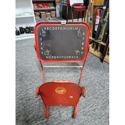 465 - A vintage 1950's metal child's Mobo chair with drawing board attached, seat is well decorated length... 