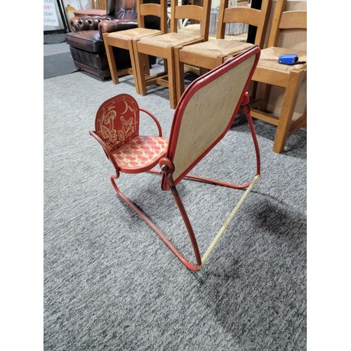 465 - A vintage 1950's metal child's Mobo chair with drawing board attached, seat is well decorated length... 