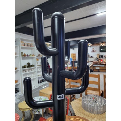 466 - Tall black plastic cactus coat stand with 6 arms stands at 175cm high base diameter 38cm