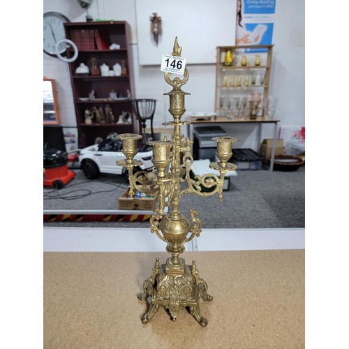 146 - Good quality ornate baroque vintage 4 tier brass candle stick with lion foot design to the centre fe... 