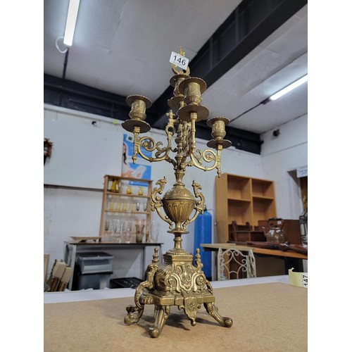 146 - Good quality ornate baroque vintage 4 tier brass candle stick with lion foot design to the centre fe... 