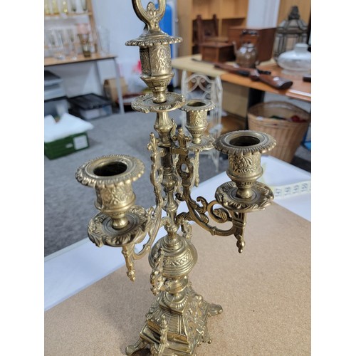 146 - Good quality ornate baroque vintage 4 tier brass candle stick with lion foot design to the centre fe... 