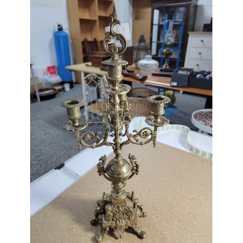 146 - Good quality ornate baroque vintage 4 tier brass candle stick with lion foot design to the centre fe... 