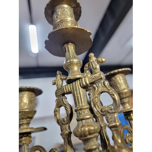 146 - Good quality ornate baroque vintage 4 tier brass candle stick with lion foot design to the centre fe... 