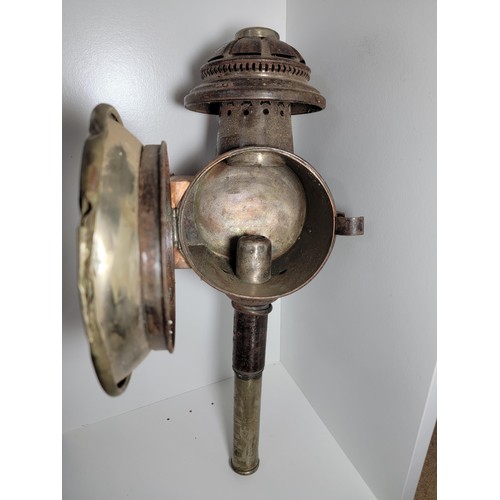 150 - Good quality antique brass coach lamp marked Simon Garron, complete with spring loaded candle holder... 