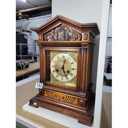 152 - Good quality Jungans striking walnut bracket clock well carved with intricate carving to the top dep... 