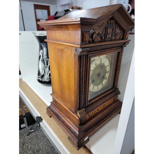 152 - Good quality Jungans striking walnut bracket clock well carved with intricate carving to the top dep... 