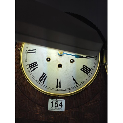 154 - Gustav Becker Domed Mantel Clock, with bevelled glass front silvered dial, chiming on gong rods, nee... 